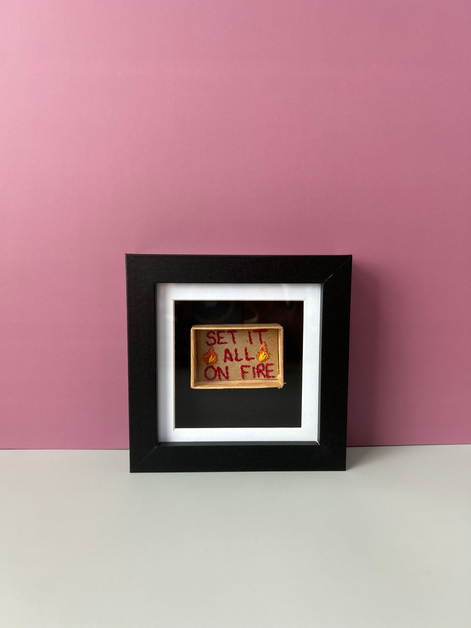 vintage embroidered matchbox that reads Set It All On Fore